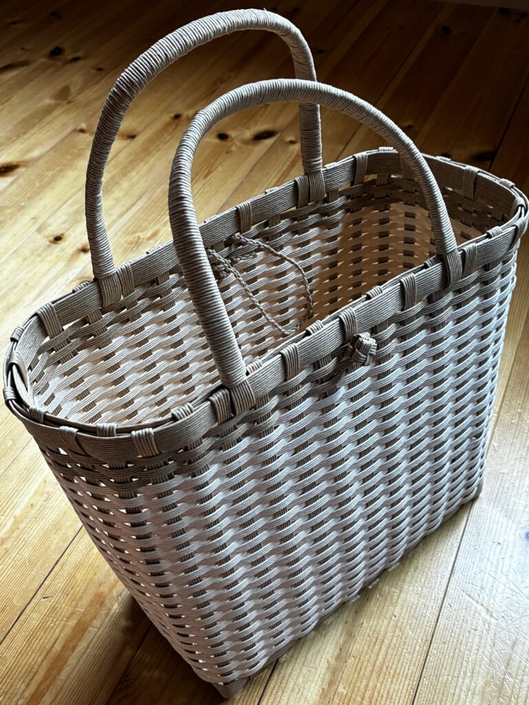 A handmade woven basket I created.